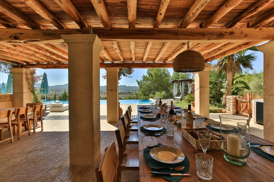 1681312783-Luxury real estate Ibiza to rent villa can Tifany spain property dining private chef outside.webp